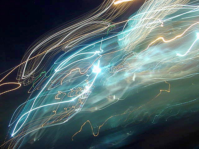 light painting, digital photography, lights through autombile windshield in the rain